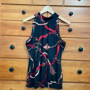 INC -size medium- great under a blazer. 92% polyester   Like new!